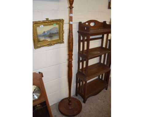 An Asian hardwood standard lamp