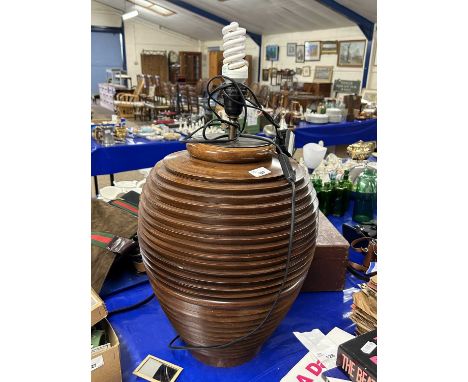 A large contemporary rib formed table lamp