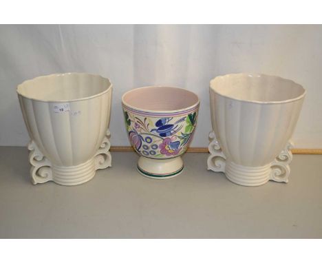A pair of Wade jardinieres together with a Poole Pottery jardiniere (3)