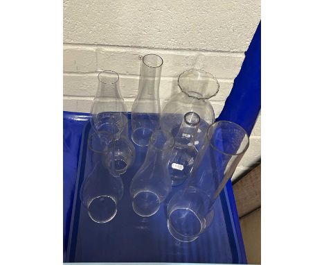 Group of various clear glass oil lamp chimneys