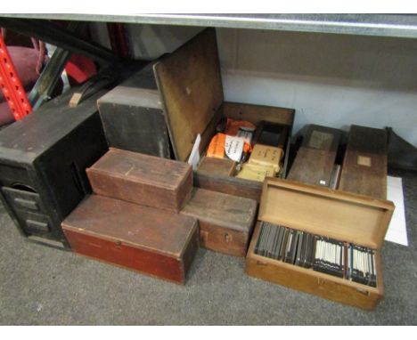 A Magic Lantern converted to electricity with original lantern box and approximately 450 slides including Zoo animals, Britis