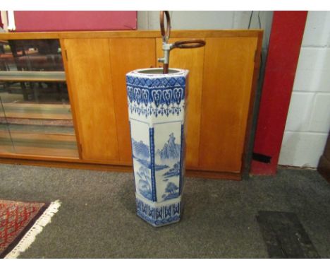 A modern Oriental blue and white hexagonal umbrella and stick stand