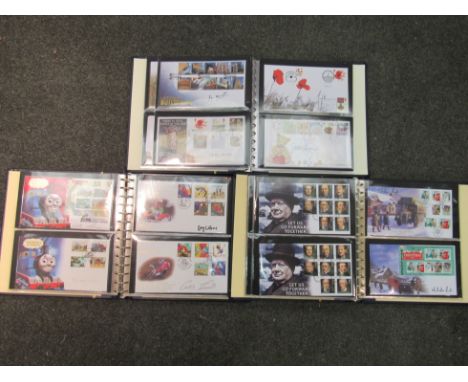 Three albums of signed first day covers to include High Valves, Science Fiction, Mountbatten of Burma, Thomas the Tank