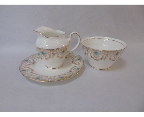 12 Place setting tea service hand painted and gilt decoration on white ground