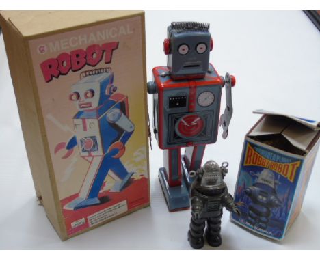 Boxed Forbiden plante Robby Robot and a boxed toy mechanical robot