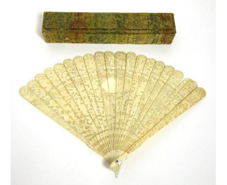 Early 19th Century Chinese Finely Carved Ivory Brisé Fan, with a dense design of buildings and figures, a central vignette le