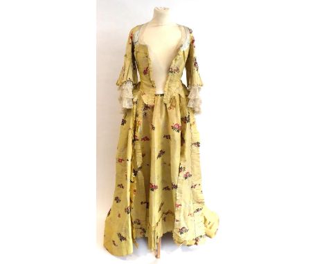 18th Century Fine Yellow Silk Open Robe and Matching Petticoat, Circa 1770-1780, woven with floral sprays, trimmed with pleat