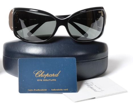 Pair of Ladies Chopard Black Sunglasses, with interlocking oval Swarovski crystal decorated mounts the hinges, centred with t