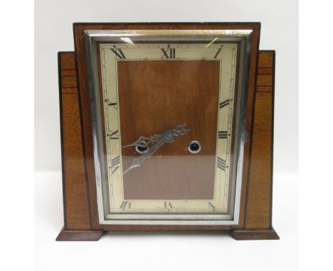 An Art Deco style veneered mantel clock, with rectangular dial, 24cm high, with key&nbsp;