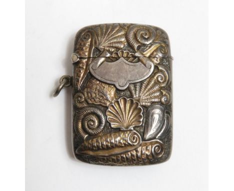 A late Victorian silver vesta case, by Jabez Hodgetts, Birmingham 1895, decorated with sea shells, with a vacant cartouche, 4