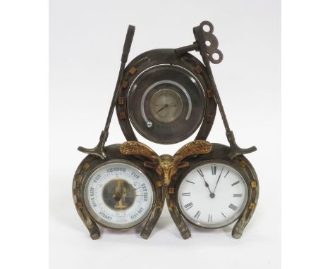 A late 19th century/early 20th century combination clock, barometer and thermometer, with a fox mask, riding crop and horsesh
