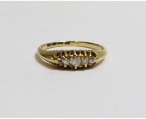 A five stone 18 carat gold diamond ring, set with small graduated old cuts, finger size R, 3.2g gross