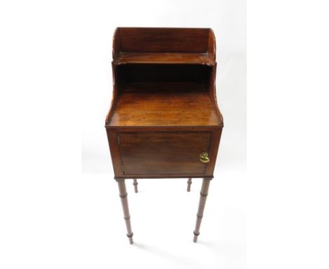 A 19th century mahogany pot cupboard, with a single shelf section on turned legs, 96cm high, 36cm long, 34cm deep