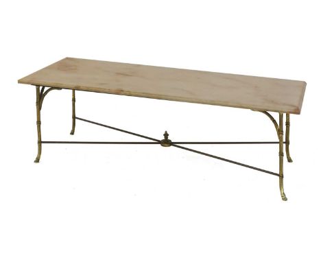 A French Maison Baguès coffee table, c.1950, with a rectangular marble top, raised on brass faux bamboo supports terminating 