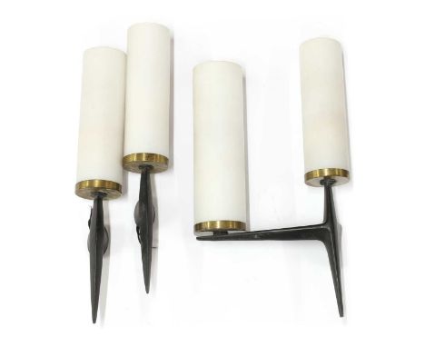 Three French wall lights,1950s, comprising:a pair of single-branch lights, fitted with cylindrical shades, one cracked, 7cm d