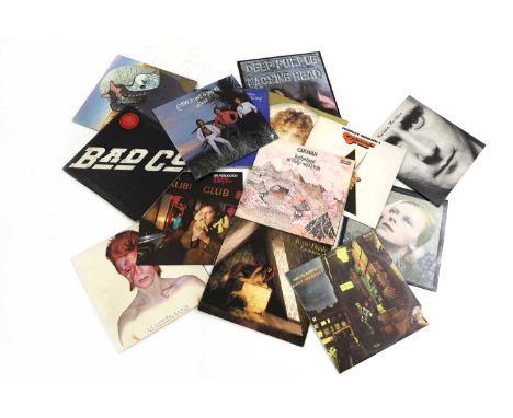 A collection of vinyl albums and singles, of 1960s and 70s classic and prog rock interest, including examples by The Beatles,