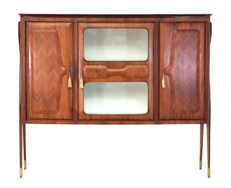 An Italian walnut drinks cabinet,1950s, designed by Vittorio Dassi, with two sycamore-lined cabinets, flanking an illuminated