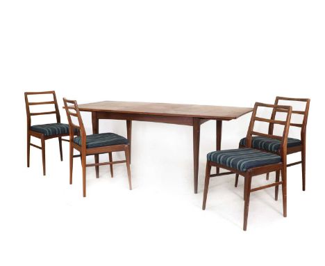 An afrormosia teak dining group, designed by Richard Hornby for Fyne Lady, comprising:an extending dining table,with a reeded