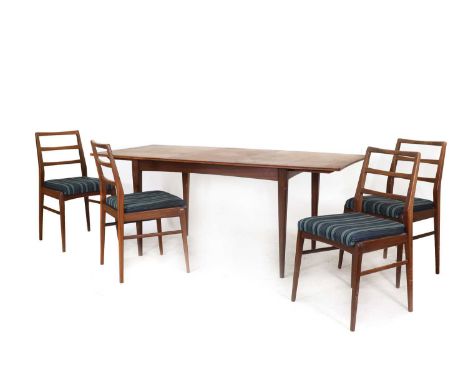 An afrormosia teak dining group, designed by Richard Hornby for Fyne Lady, comprising:an extending dining table,with a reeded