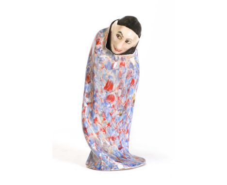 Harry Tittensor for Royal Doulton,'Spook', a rare ceramic model c.1916-1936, with a black cap and a mottled red and blue cape