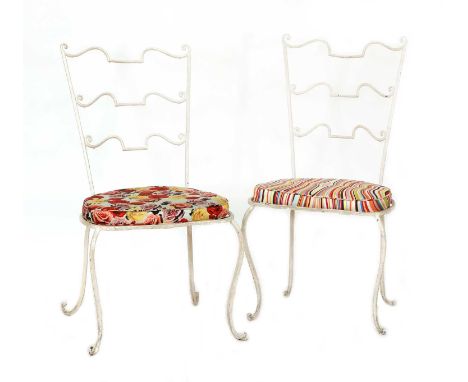 A pair of painted wrought iron garden chairs,with squab cushions upholstered in 'Swirl' and 'Rose' fabric by Paul Smith,48cm 