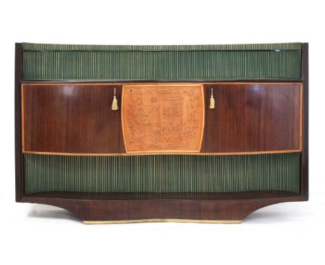 An Italian rosewood sideboard,by Dassi, 1950s, of serpentine form with a glass shelf and a reeded panel back, the central cup