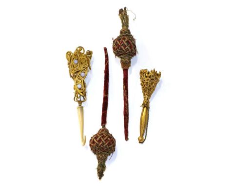 A Victorian gilt metal opal and mother-of-pearl nosegay holder, as stylised leaf fronds on a scroll handle, 18cm; a similar g