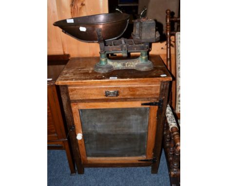 A set of old shop scales and a larder cupboard 