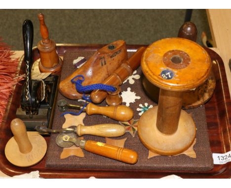 Assorted mainly treen sewing accessories including a bodkin holder, darning tool, bobbin, cutting tools, single childs shoe l