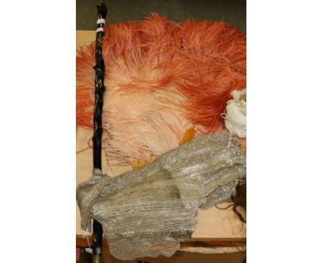 Circa 1920s large peach ostrich feather fan with yellow resin sticks and guards, a woven metallic thread evening jacket and a