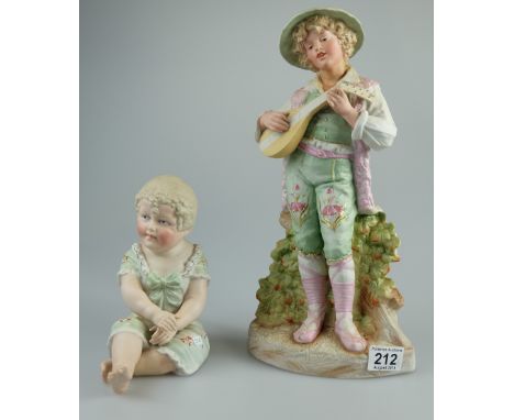 Continental unmarked Bisque figures of Peasant boy playing Mandolin (damaged neck) and Piano baby (2)