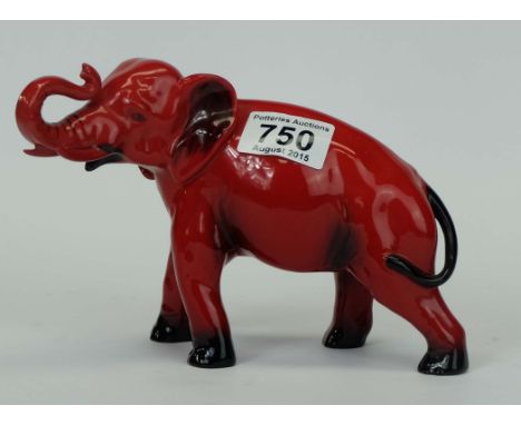 Royal Doulton flambe Elephant with trunk in salute, height 14cm