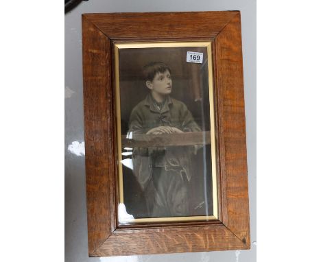 A Dorothy Tennant print of ' His First Offence' in heavy oak frame