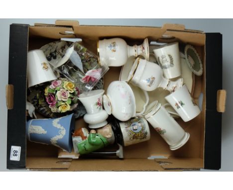 A collection of pottery to include Wedgwood vase, commemorative cups and saucers, plates etc 