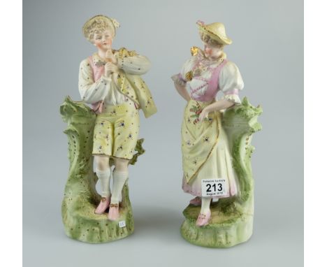 Continental unmarked Bisque figures Man Playing Flute (flute damaged) and similar dancer (chip to hat) (2)
