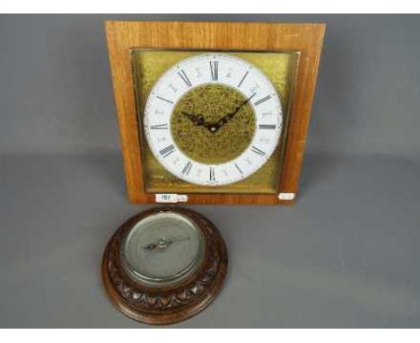 A Kienzle automatic wall clock and barometer. [2]