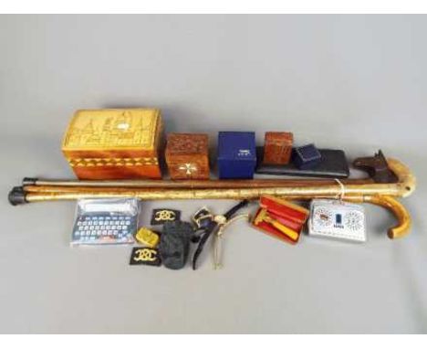 A mixed lot of collectables to include walking sticks, trinket box, vintage razor, boxed Ronson lighter, cased technical draw
