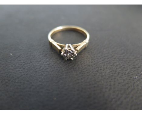 A 9ct yellow gold diamond solitaire ring illusion set, size I, approx 1.5 grams, some usage marks, otherwise good