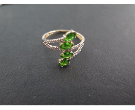 A 9ct yellow gold chrome Diopside and diamond ring size R/S - approx weight 2.4 grams - in good condition