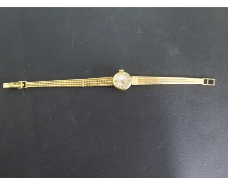 A ladies 18ct yellow gold Rolex precision bracelet wristwatch - manual wind - 16mm wide including winder - approximately 22.5
