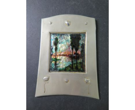 A good quality Art Nouveau white metal plaque with impressionist enamel of trees by a river - initialled bottom right - possi