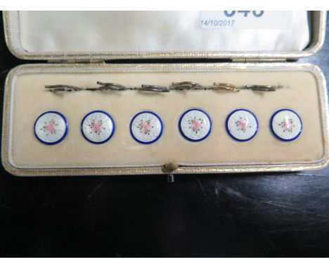 A set of six silver and enamel buttons with floral design to centre - no damage to enamel