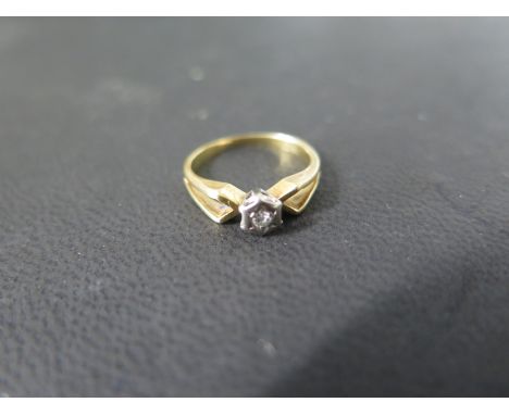 An 18ct yellow gold solitaire diamond ring size H, approx 2.4 grams, some usage marks, otherwise good