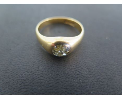 An 18ct yellow gold diamond ring - size T - approx 7.5 grams - some usage marks - diamond bright and lively