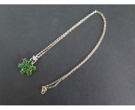 A 9ct yellow gold diopside and diamond necklace - approx weight 3.9 grams - in good condition