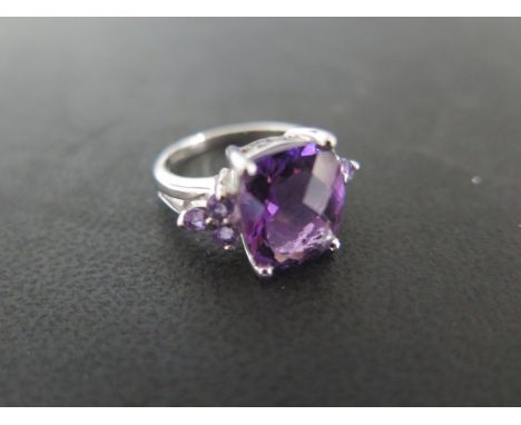 A 9ct white gold amethyst ring size N - approx weight 5.5 grams - stone approx 4ct - in good condition 