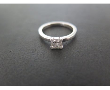 A hallmarked platinum diamond solitaire - ring size J - approx 4.4 grams - square cut diamond approx 0.50ct - in good conditi