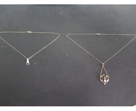 A 9ct yellow gold necklace with opal and seed pearl pendant and a 9ct yellow gold necklace with sapphire pendant - both in go