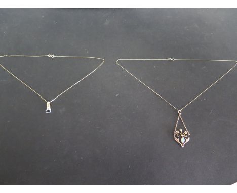 A 9ct yellow gold necklace with opal and seed pearl pendant and a 9ct yellow gold necklace with sapphire pendant - both in go