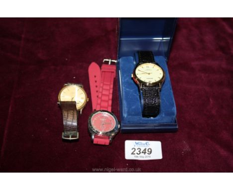 A cased Sekonda water resistance quartz mans watch, a cotton traders watch and a Timex watch a/f.